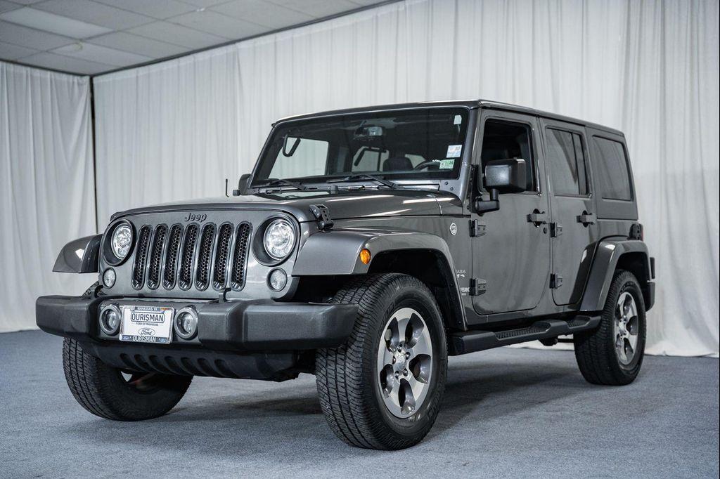 used 2018 Jeep Wrangler JK Unlimited car, priced at $18,500