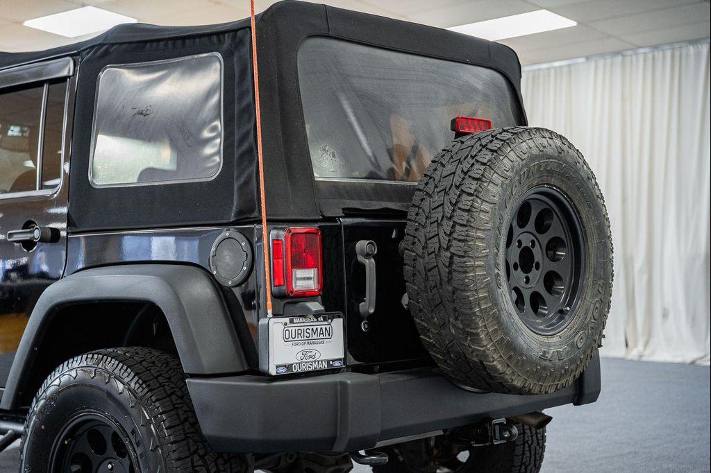 used 2014 Jeep Wrangler Unlimited car, priced at $18,000
