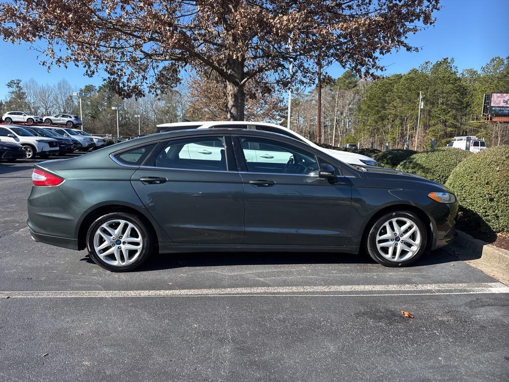 used 2015 Ford Fusion car, priced at $10,000