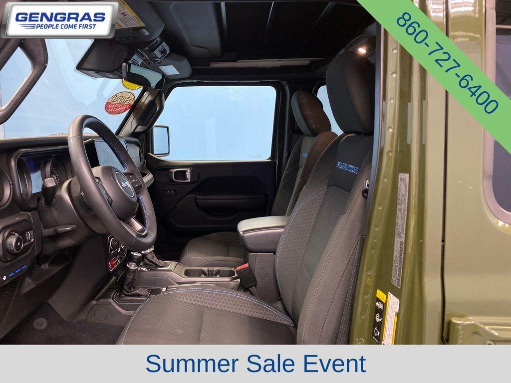 used 2024 Jeep Wrangler 4xe car, priced at $35,098