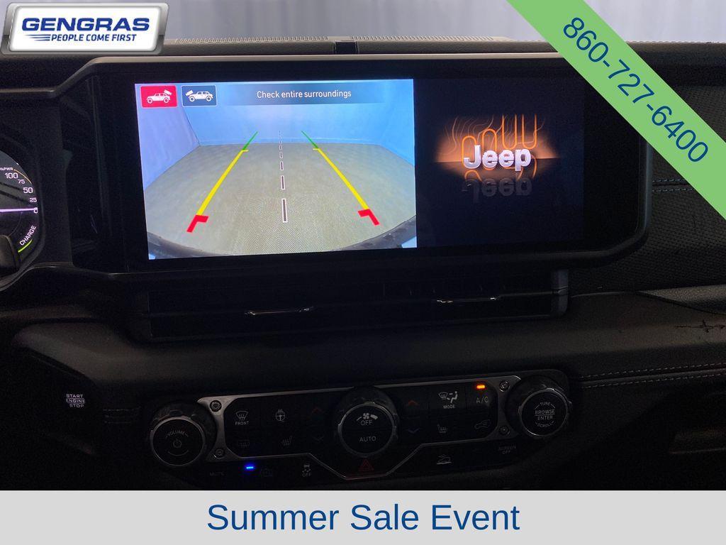 used 2024 Jeep Wrangler 4xe car, priced at $35,098