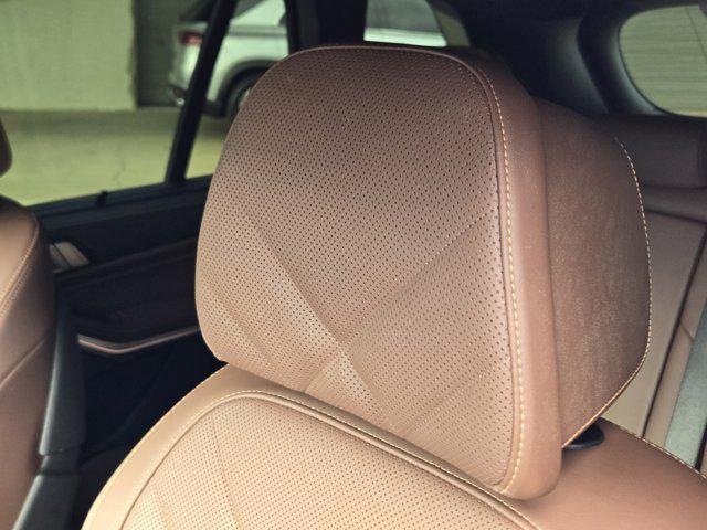 used 2024 BMW X5 car, priced at $54,077