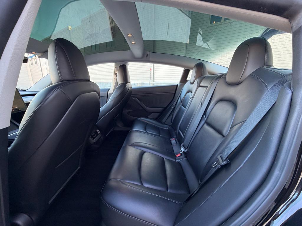 used 2023 Tesla Model 3 car, priced at $19,950
