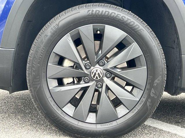used 2024 Volkswagen Taos car, priced at $18,142