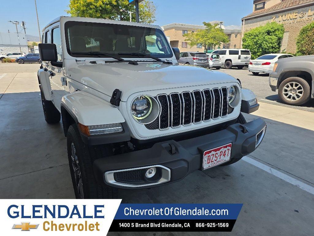 used 2025 Jeep Wrangler car, priced at $33,818