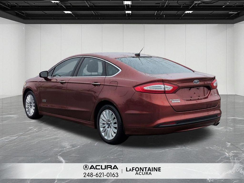 used 2014 Ford Fusion Energi car, priced at $6,995
