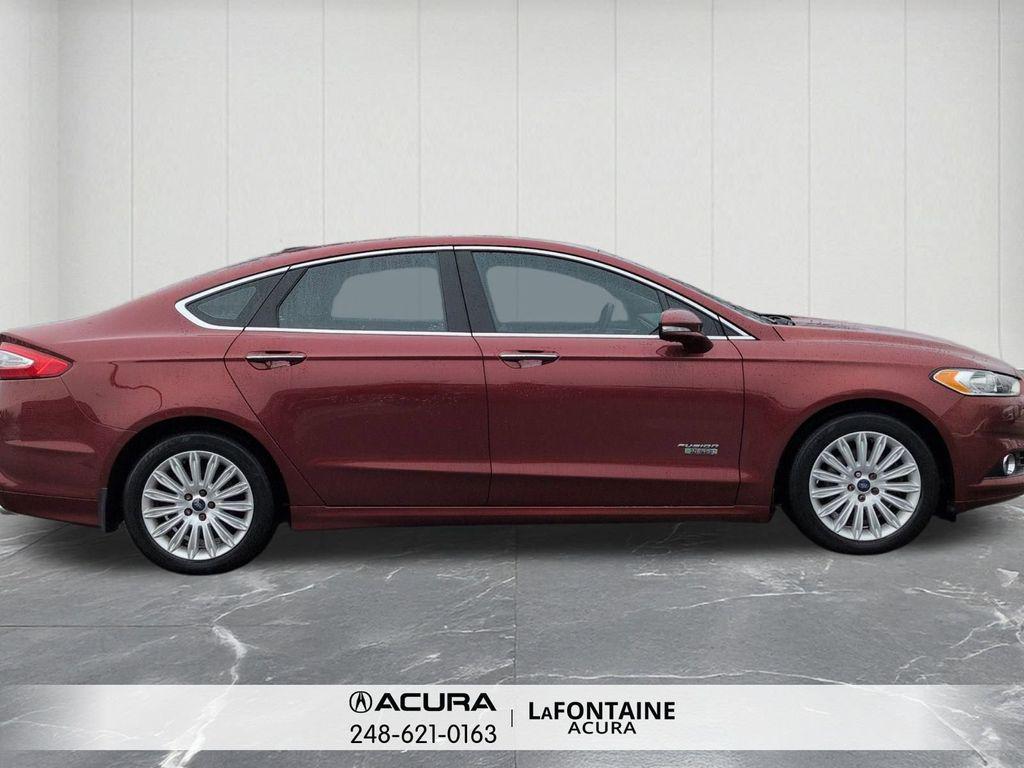 used 2014 Ford Fusion Energi car, priced at $6,995
