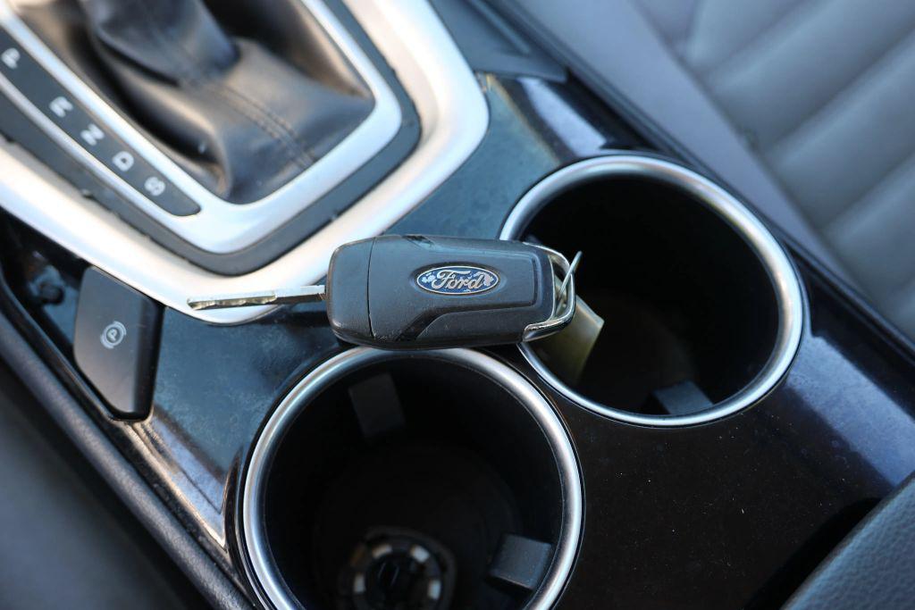 used 2014 Ford Fusion car, priced at $3,998