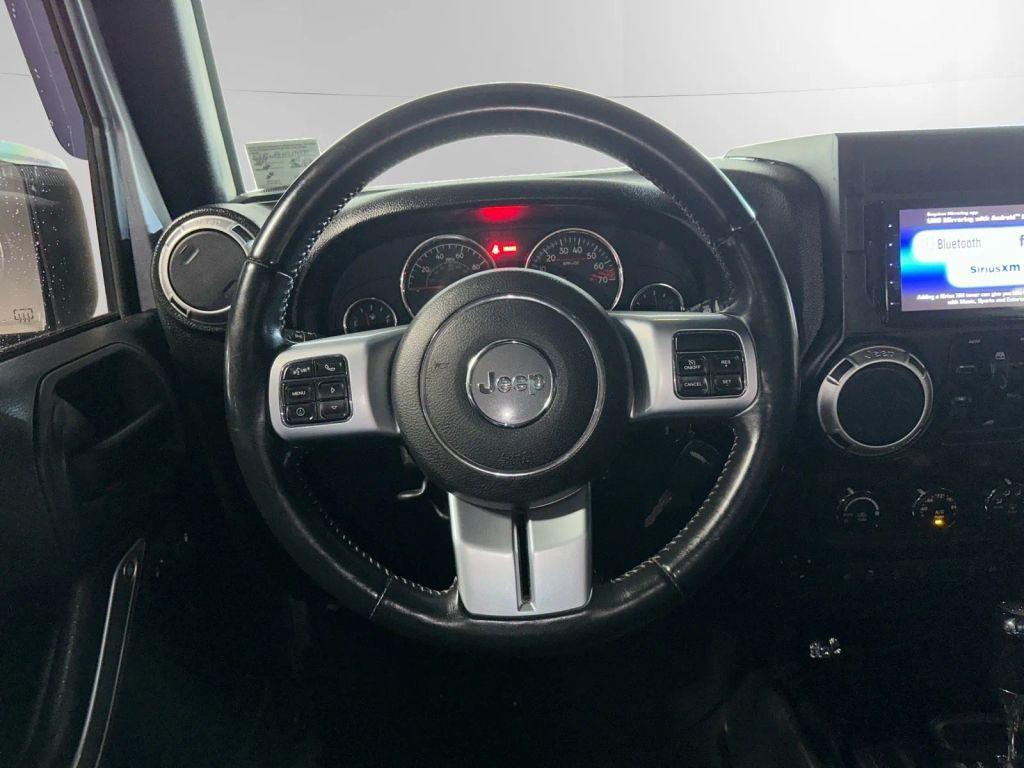used 2015 Jeep Wrangler Unlimited car, priced at $18,995