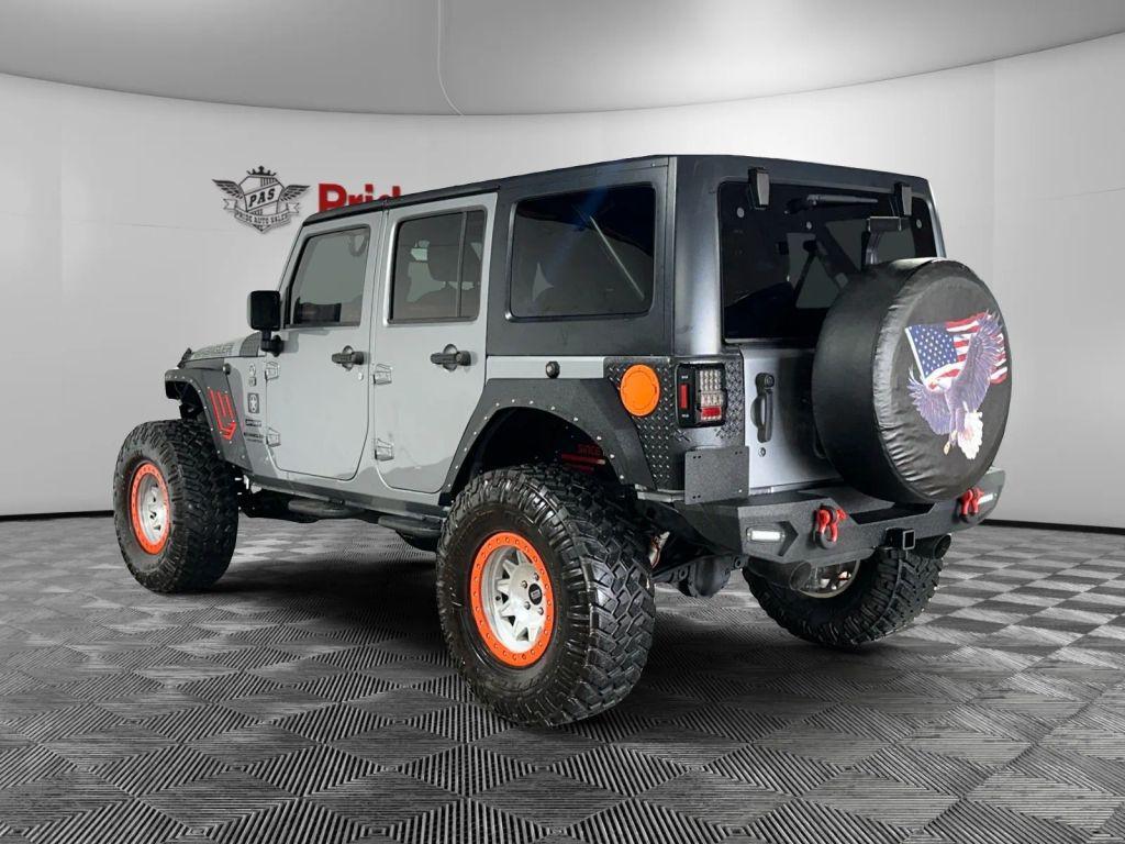 used 2015 Jeep Wrangler Unlimited car, priced at $17,886