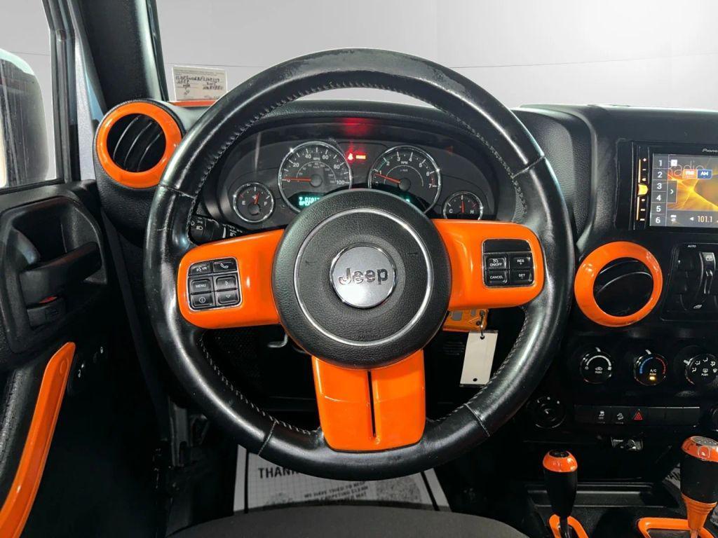 used 2015 Jeep Wrangler Unlimited car, priced at $17,886