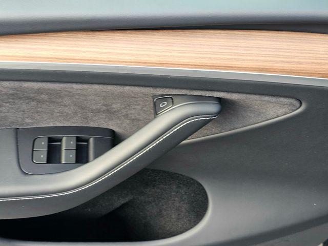 used 2024 Tesla Model Y car, priced at $38,488