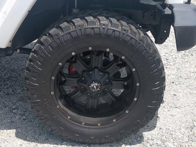 used 2014 Jeep Wrangler Unlimited car, priced at $20,786
