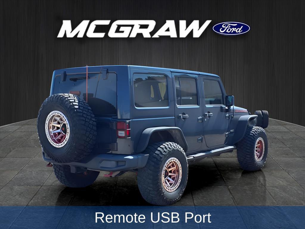 used 2017 Jeep Wrangler Unlimited car, priced at $29,104