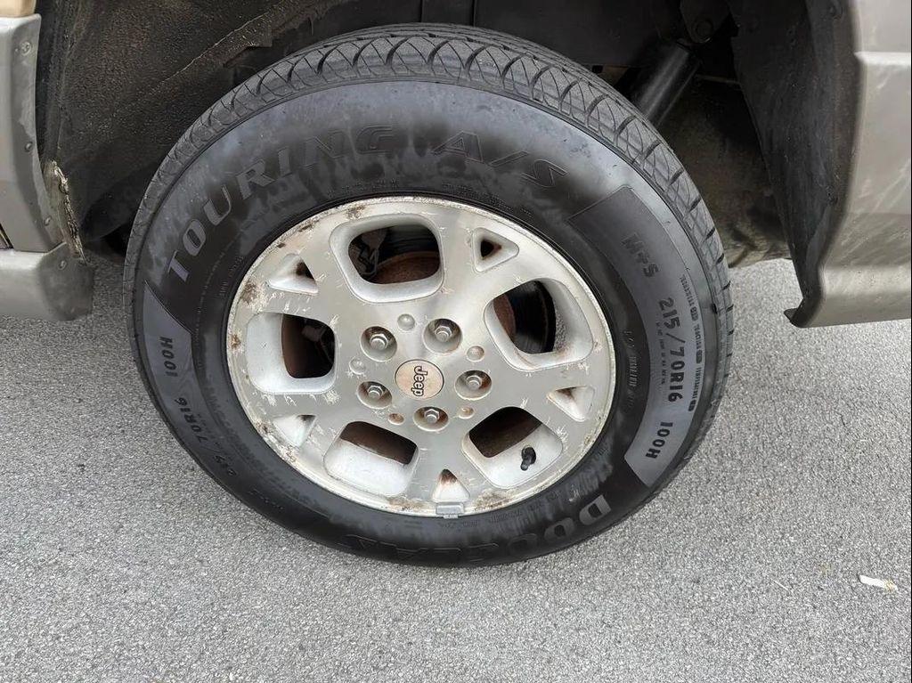 used 1999 Jeep Grand Cherokee car, priced at $3,500