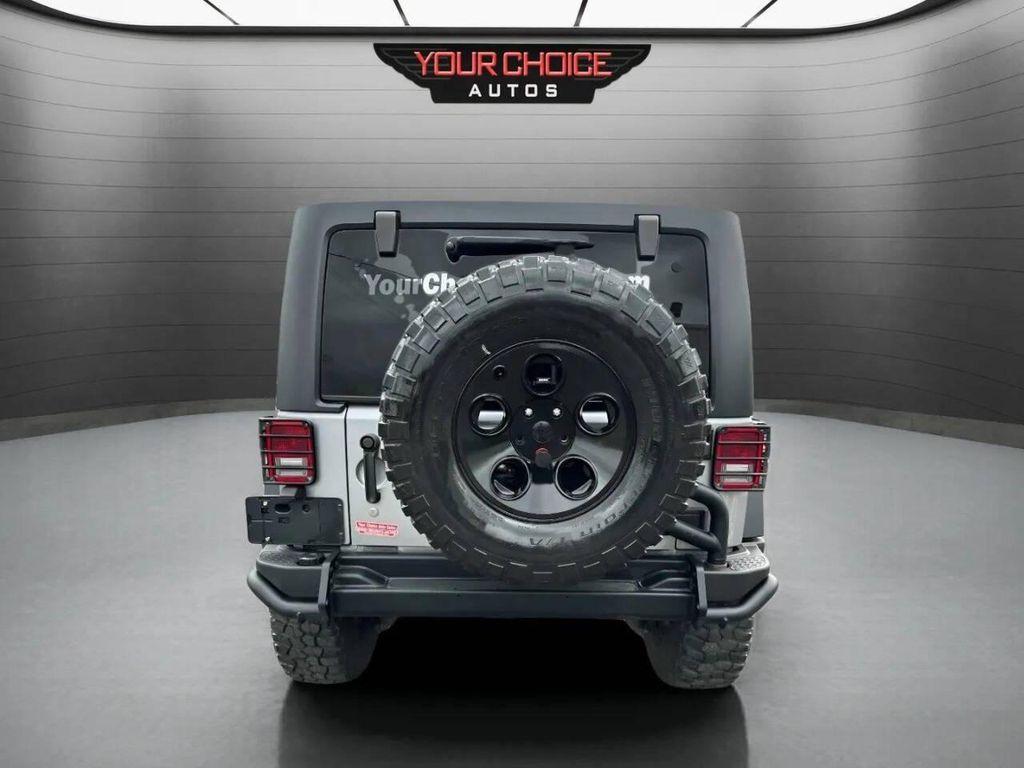 used 2015 Jeep Wrangler Unlimited car, priced at $23,977