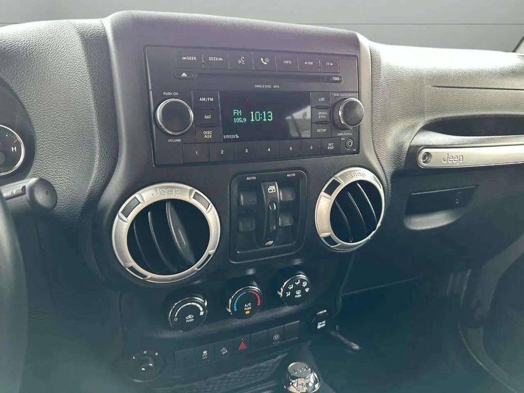 used 2015 Jeep Wrangler Unlimited car, priced at $23,977