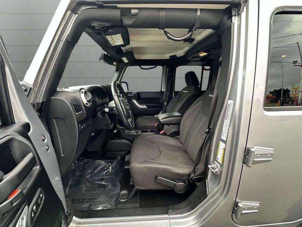 used 2015 Jeep Wrangler Unlimited car, priced at $23,977