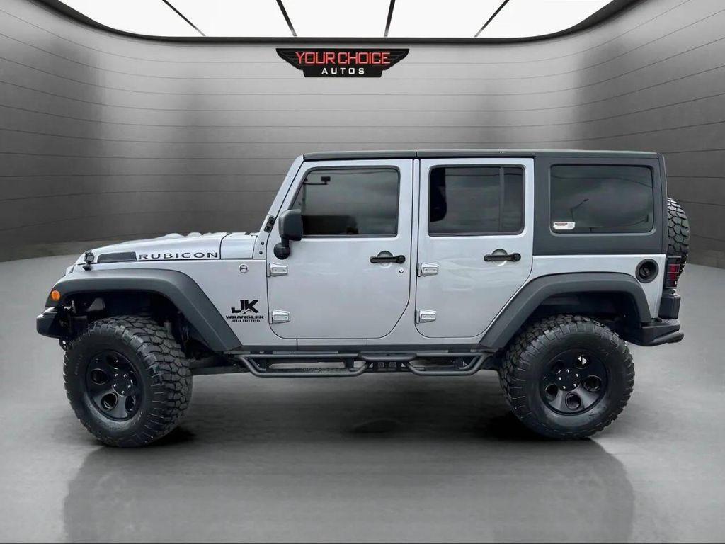 used 2015 Jeep Wrangler Unlimited car, priced at $23,977