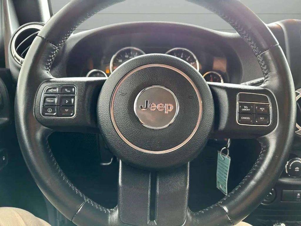 used 2015 Jeep Wrangler Unlimited car, priced at $23,977