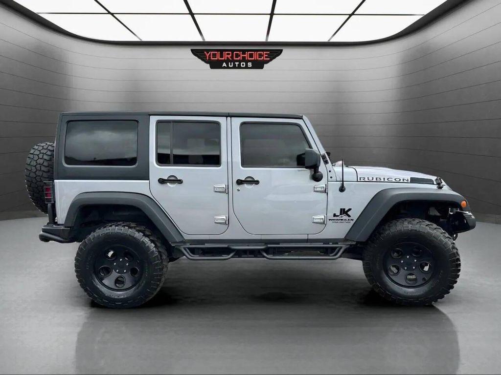 used 2015 Jeep Wrangler Unlimited car, priced at $23,977