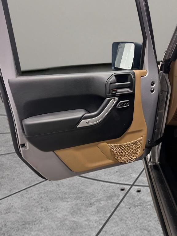 used 2014 Jeep Wrangler Unlimited car, priced at $15,850