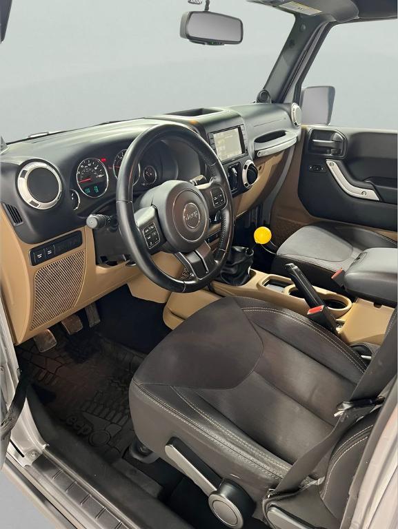 used 2014 Jeep Wrangler Unlimited car, priced at $15,850