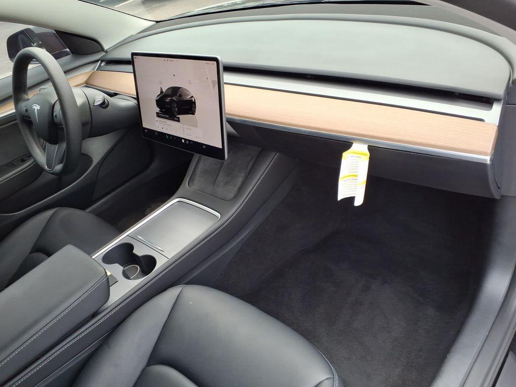 used 2023 Tesla Model 3 car, priced at $24,497
