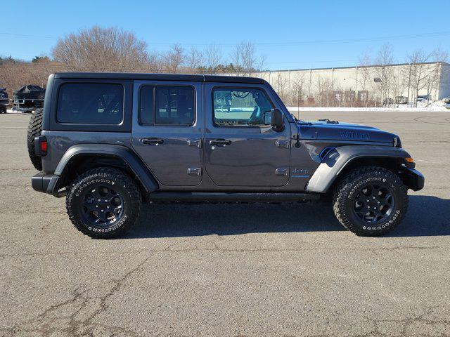 used 2023 Jeep Wrangler 4xe car, priced at $32,824