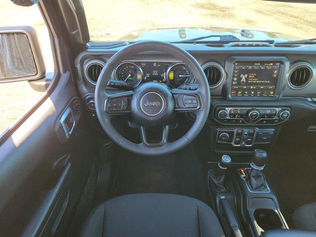 used 2023 Jeep Wrangler 4xe car, priced at $32,824