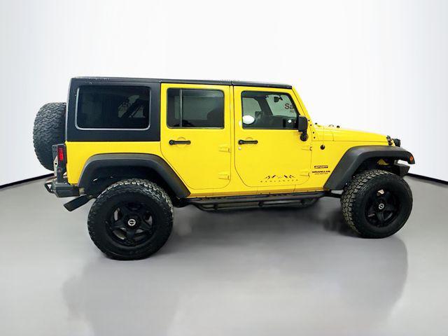 used 2015 Jeep Wrangler Unlimited car, priced at $12,900