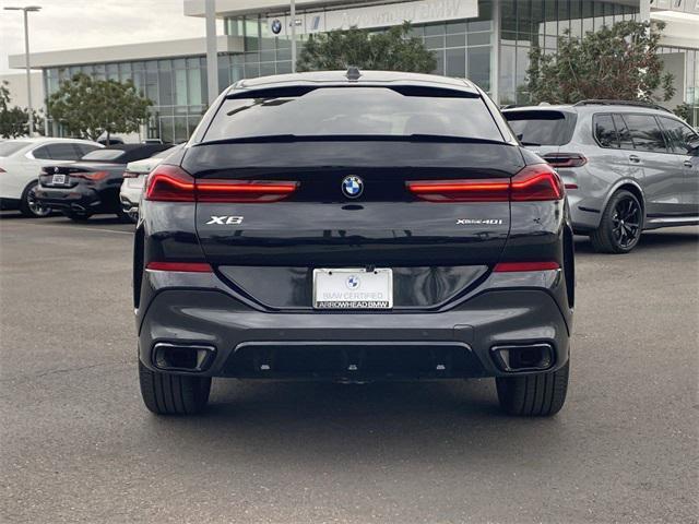 used 2024 BMW X6 car, priced at $63,964