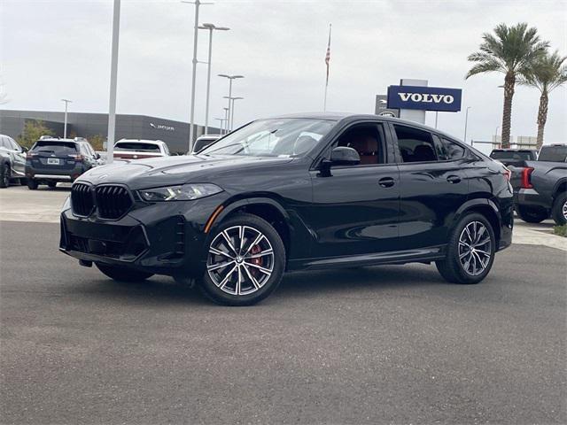 used 2024 BMW X6 car, priced at $63,964