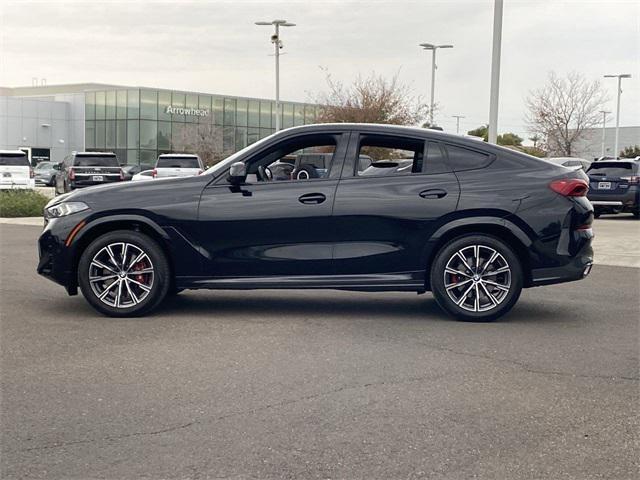 used 2024 BMW X6 car, priced at $63,964