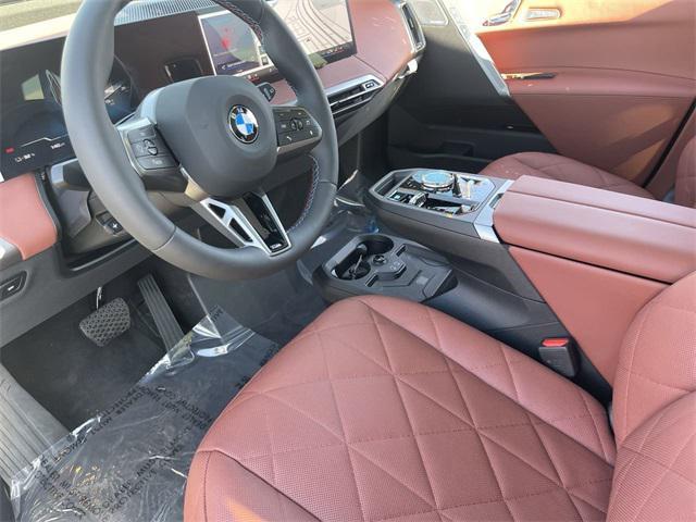 new 2025 BMW iX car, priced at $123,555