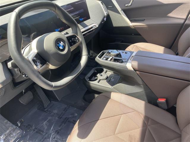 new 2026 BMW iX car, priced at $88,325