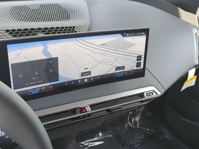 new 2026 BMW iX car, priced at $102,545