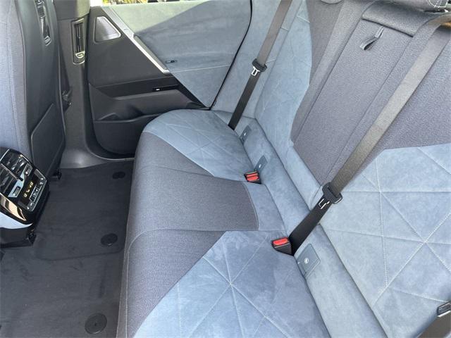 new 2025 BMW iX car, priced at $117,155