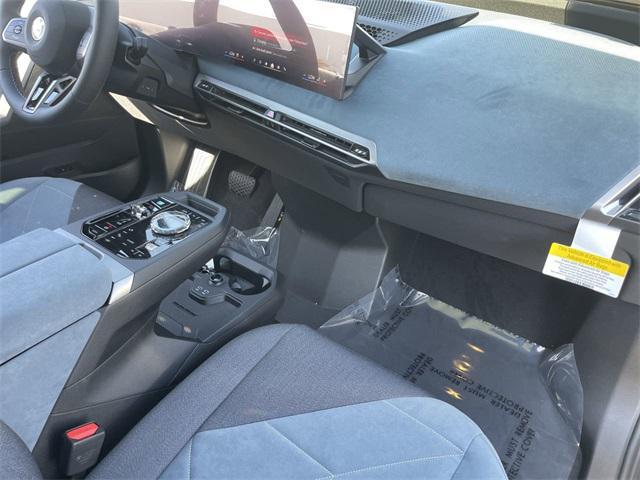 new 2025 BMW iX car, priced at $117,155