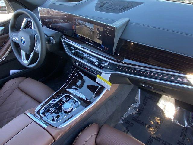 used 2026 BMW X5 PHEV car, priced at $76,947