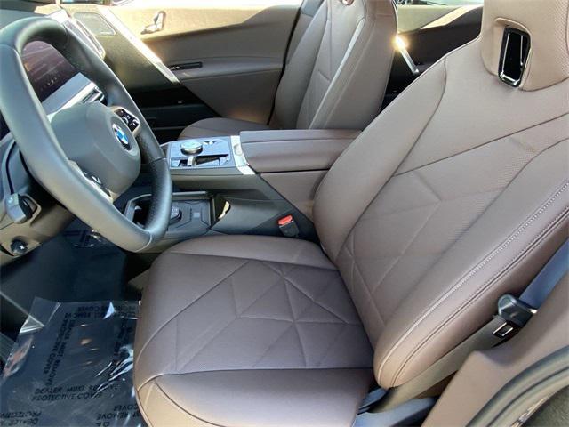 new 2026 BMW iX car, priced at $100,625