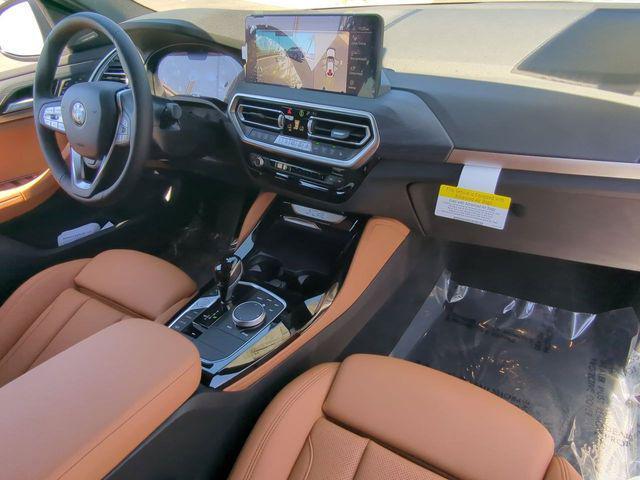 used 2025 BMW X4 car, priced at $52,116