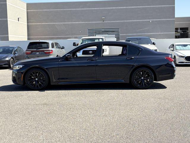 used 2022 BMW 740 car, priced at $42,153