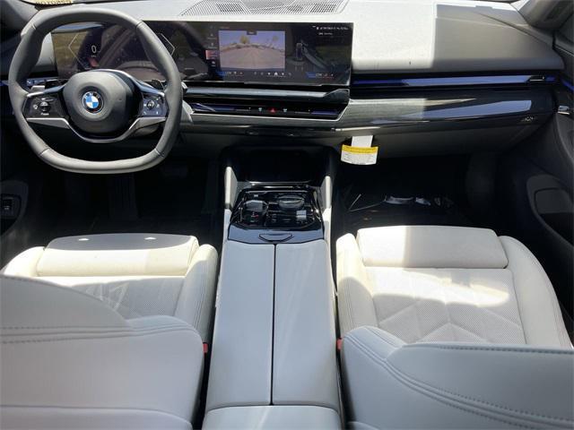 new 2025 BMW 530 car, priced at $61,940