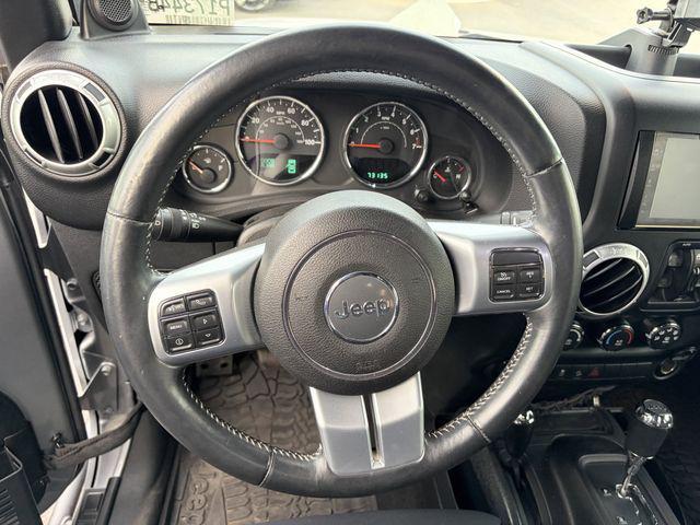 used 2014 Jeep Wrangler Unlimited car, priced at $21,647