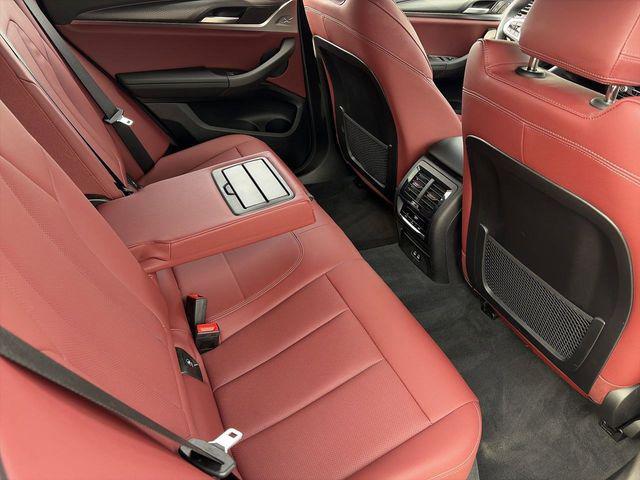 used 2025 BMW X4 car, priced at $61,209