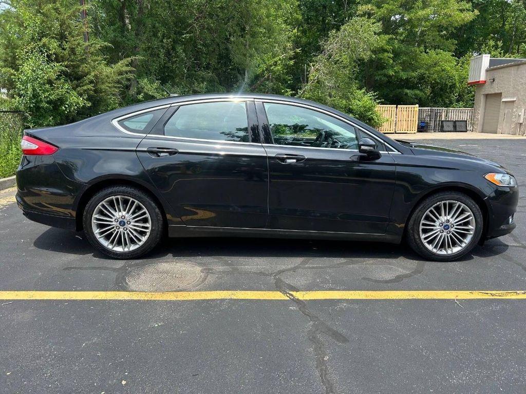 used 2015 Ford Fusion car, priced at $8,900