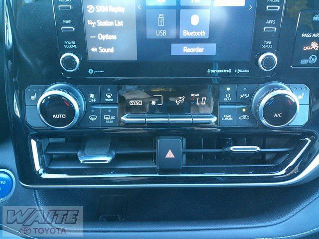 used 2021 Toyota Highlander Hybrid car, priced at $30,900