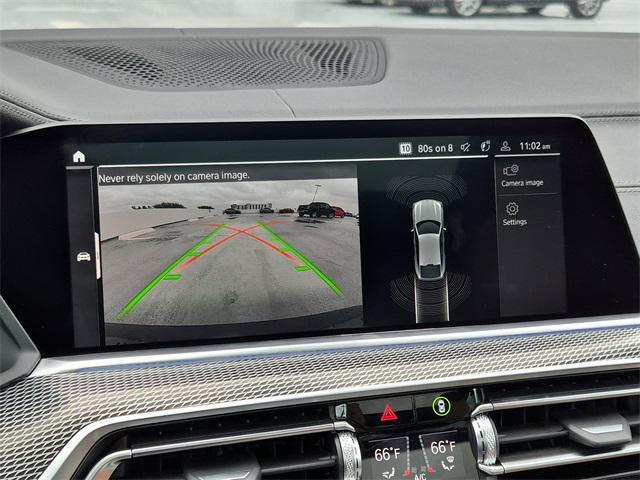 used 2023 BMW X6 car, priced at $55,400