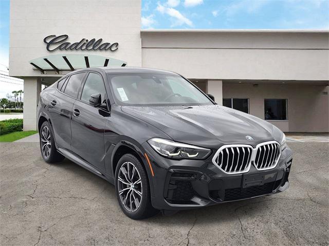 used 2023 BMW X6 car, priced at $55,400